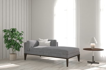 Fototapeta premium White room with modern sofa. Scandinavian interior design