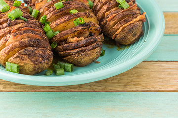 Hasselback potatoes with smoked paprika and bacon.