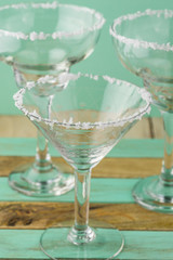 Salt rim glasses for margarita cocktail.