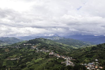 Obraz premium Mountains trees clouds cool weather.