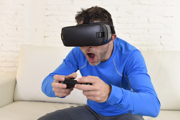 happy man at home living room sofa couch excited using 3d goggles watching 360 virtual reality