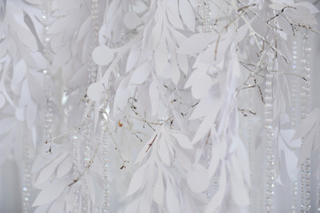 Textile background closeup. White drapery fabric flowers. Wedding texture, lace