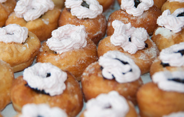 sweet donuts with cream, closeup