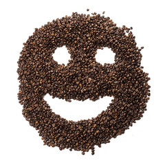 Smile face made of coffee beans isolated on white