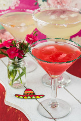 Mexican fiesta table with assorted margaritas cocktail.