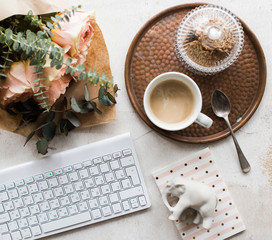 Feminine tabletop, home office with flowers