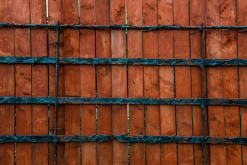 Wooden garden fence barrier and old metal gate background