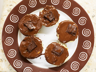 Chocolate cupcakes with piece of dark chocolate