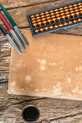 red telephone on wood background old style