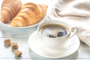 Croissants with cup of coffee