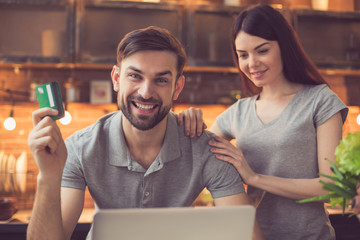 Young couple ordering food online