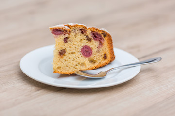 Piece of rustic cherry cake