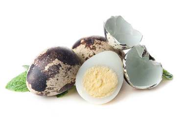 boiled quail eggs on white background