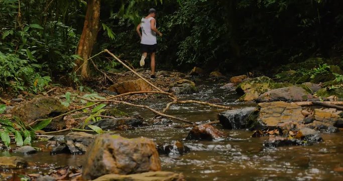 Man running in the jungle