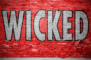 Wicked Ziegelsteinmauer Graffiti