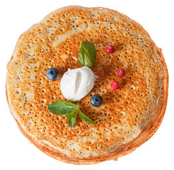 The top view on pancakes with holes.