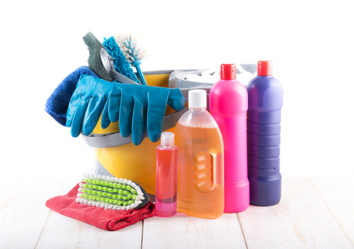 Cleaning products and tools on a wooden floor,Cleaning concept
