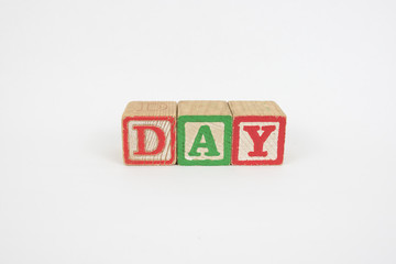 The Word Day in Wooden Childrens Blocks