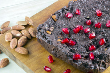 Homemade nut fudge on wood board