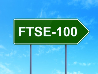 Stock market indexes concept: FTSE-100 on road sign background