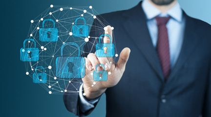 Businessman using digital padlock to secure