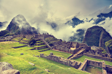 MACHU PICCHU, PERU - MAY 31, 2015: View of the ancient Inca City of Machu Picchu. The 15-th century...