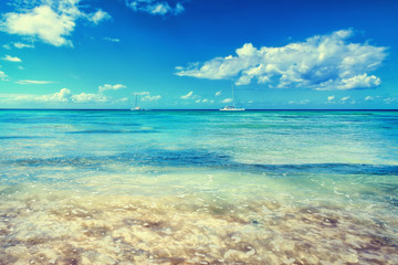 Obraz premium Caribbean sea. Tropical, exotic water landscape with yachts on horizon. Topical paradise. Ocean nature. Saona Island. Domincan Republic