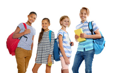 Obraz premium Cute schoolchildren, isolated on white