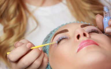 Woman on cosmetic procedure at salon
