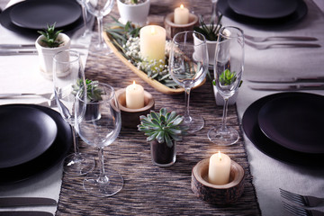 Table served with succulents for dinner in living room