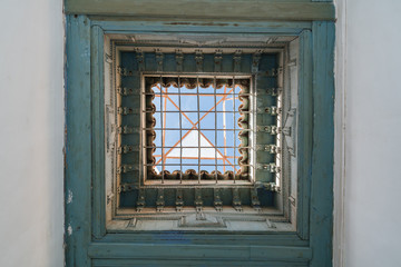 Fototapeta na wymiar Colorful oriental Ceiling fragment inside the Bahia palace