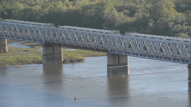 Railway bridge, train. Ufa, the Belaya River, Russia. 