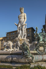 Fototapeta na wymiar fountain of Neptune on the Piazza della Signoria in front of the Palazzo Vecchio in Florence, Italy