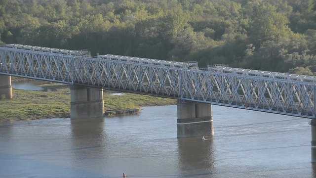 Railway bridge, train. Ufa, the Belaya River, Russia. 