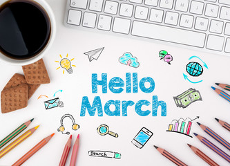 Hello March, Business concept. Computer keyboard and a coffee mug on a white table