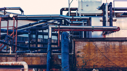 Many industrial pipes going different directions