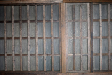 Obraz na płótnie Canvas Sliding wooden latticed windows in the Shinto temple, Japan.