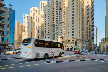 Fototapeta na wymiar Crossroad in Dubai, traffic in motion