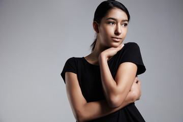 mixed race woman's portrait with ideal shining skin and healthy hair