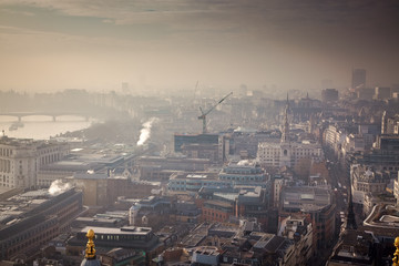 rooftop view over London on a foggy day from St Paul's cathedral, UK