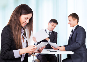A serious meeting of business men at the office, partners in Discussion background