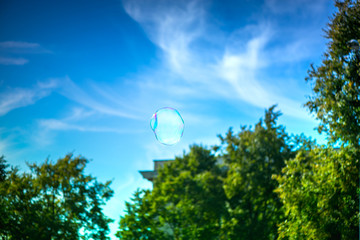 Shot of a bubble flying in the sky

