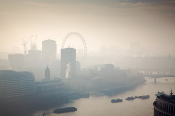 rooftop view over London on a foggy day from St Paul's cathedral, UK