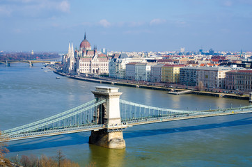 Fototapeta na wymiar Skyline panorama of Budapest, Chain Bridge, Hungarian Parliament and houses.