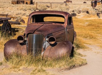 Rusted Car Left In Ghost Town