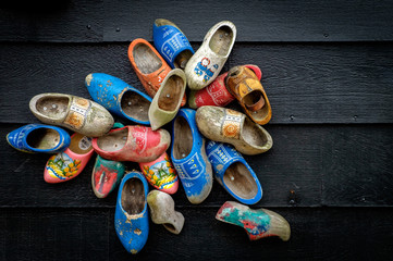 Traditional dutch wooden shoes mounted on a wall