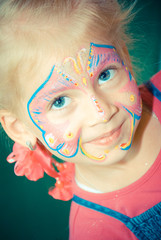 Pretty Girl Child with face painting. Make up.