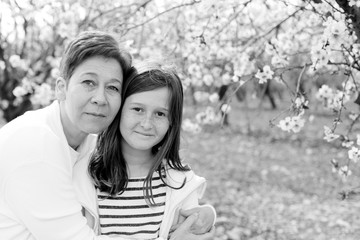 Happy mother and daughter outdoors. Mother day.