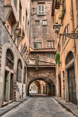 Naklejka na ściany i meble Florence, Tuscany, Italy: alley in the old town