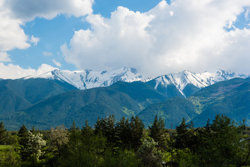 Mountain peaks covered with snow after the winter season
